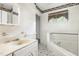 Bathroom featuring a tub and sink at 5062 Dorsey Rd, Oxford, NC 27565