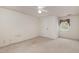 Bedroom with neutral walls, carpeted flooring, and a ceiling fan at 5062 Dorsey Rd, Oxford, NC 27565