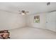 Bedroom showcasing neutral walls, carpeted flooring, and window at 5062 Dorsey Rd, Oxford, NC 27565