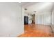 Open living room with hardwood floors and a glimpse into the kitchen for easy entertaining at 5062 Dorsey Rd, Oxford, NC 27565