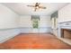 Living room features a cozy fireplace, classic decor, and natural light at 5062 Dorsey Rd, Oxford, NC 27565