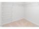 Walk-in closet with wire shelving and neutral colored carpet at 522 Lochalsh Dr, Gibsonville, NC 27249
