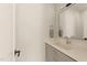 Modern powder room features sleek vanity with stylish mirror and fixtures for guests at 528 1/2 Bragg St, Raleigh, NC 27610