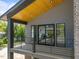 Cozy balcony with wood floors and modern railings, perfect for relaxing outdoors at 528 Bragg St, Raleigh, NC 27610