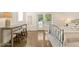 Bright bedroom with modern furnishings, workspace and natural light at 528 Bragg St, Raleigh, NC 27610