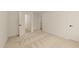 Bright bedroom features plush carpet, and ample closet space in a neutral color palette at 528 Bragg St, Raleigh, NC 27610