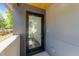 Modern entryway featuring a glass door with views of the staircase and bright interior at 528 Bragg St, Raleigh, NC 27610