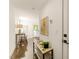 Bright hallway featuring clean lines, modern decor, and a view to the exterior at 528 Bragg St, Raleigh, NC 27610