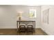 Hallway with a work station area featuring a view to the outside through the window at 528 Bragg St, Raleigh, NC 27610