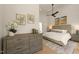 Serene main bedroom with plush bedding, hardwood floors, and tasteful decor for relaxation at 528 Bragg St, Raleigh, NC 27610