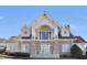 View of clubhouse showing stone and siding exterior with double door entry at 5912 Hourglass Ct, Raleigh, NC 27612