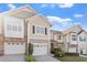 Beautifully maintained townhome with a one car garage, and nicely landscaped yard at 5912 Hourglass Ct, Raleigh, NC 27612