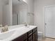 Bathroom with double vanity, white countertop, and tiled floors at 709 Wickham Ridge Rd, Apex, NC 27539