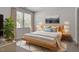 Cozy bedroom with soft carpet, abundant natural light, and tasteful decor at 709 Wickham Ridge Rd, Apex, NC 27539