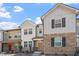 Charming townhome with stone facade and multiple windows at 709 Wickham Ridge Rd, Apex, NC 27539