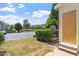 Exterior ground-level side view with parking and tidy landscaping at 709 Wickham Ridge Rd, Apex, NC 27539