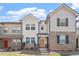 Charming townhome featuring neutral siding, brick accents, and a covered front porch at 709 Wickham Ridge Rd, Apex, NC 27539