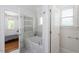 This bathroom boasts a soaking tub, a heated towel rack, and is brightly lit at 715 Kimbrough St, Raleigh, NC 27608