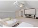This media room offers an overhead projector, ceiling fan, and a large blank screen for movies and entertainment at 715 Kimbrough St, Raleigh, NC 27608