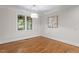 Sun-filled room with hardwood floors, a large window, and neutral walls, providing a calming atmosphere at 715 Kimbrough St, Raleigh, NC 27608