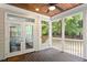 Screened porch provides outdoor access and views of the backyard through framed screened openings at 715 Kimbrough St, Raleigh, NC 27608