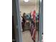 Walk-in closet offering ample storage with organized shelving and clothing racks at 7401 Walnut Grove Ln, Zebulon, NC 27597