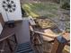 Wooden deck with railing, benches, and steps leading to the garden, offering an outdoor space at 7401 Walnut Grove Ln, Zebulon, NC 27597