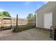 Private backyard space with a fenced garden area and concrete patio at 831 S White St, Wake Forest, NC 27587