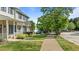 Charming home exterior with well-manicured lawn and tree-lined street at 831 S White St, Wake Forest, NC 27587