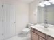 Neutral toned bathroom featuring a toilet and a sink vanity at 102 Downing Forest Pl, Cary, NC 27519