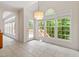 Breakfast nook features large windows for ample natural light and views to other rooms at 102 Downing Forest Pl, Cary, NC 27519