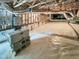 Clean and encapsulated crawl space with a dehumidifier and insulated walls at 102 Downing Forest Pl, Cary, NC 27519