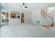 Bright living room leads to kitchen, entryway, and second floor, creating an open floorplan at 102 Downing Forest Pl, Cary, NC 27519