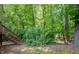 Lush backyard featuring mature trees and greenery at 103 Westview Dr # Apt K, Carrboro, NC 27510