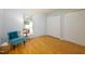 Bright bedroom features beautiful laminate flooring and a large window with natural light at 103 Westview Dr # Apt K, Carrboro, NC 27510