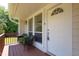 Close-up of the front porch with seating, providing a cozy view of the home's entrance at 103 Westview Dr # Apt K, Carrboro, NC 27510