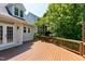 Large wooden deck extends from the home offering an outdoor space at 105 Bardsey Ct, Cary, NC 27513