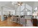 Open living space with vaulted ceilings, modern furniture, and hardwood floors at 105 Bardsey Ct, Cary, NC 27513