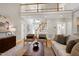Spacious living room features high ceilings, a loft, and a cozy seating area at 105 Bardsey Ct, Cary, NC 27513