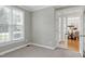 Office space with a large window providing natural light, with a view to the adjacent dining room at 105 Bardsey Ct, Cary, NC 27513
