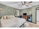 Spacious bedroom featuring a ceiling fan, window and dresser at 106 Blackfoot Dr, Louisburg, NC 27549