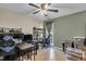Spacious office area with tile flooring, large windows and a fan at 106 Blackfoot Dr, Louisburg, NC 27549