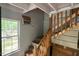 Unfinished stairway with view of backyard at 108 Horseman Dr, Louisburg, NC 27549