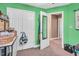 Well-lit craft room with storage and a mirror at 11 Bridgeport Dr, Durham, NC 27713