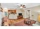 Open concept living room featuring hardwood floors, a bar area, and view of the kitchen at 11 Bridgeport Dr, Durham, NC 27713