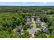 Aerial view of a neighborhood with mature trees at 11 Smoketree Ct, Durham, NC 27712