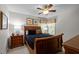 Bedroom with a wooden bed frame, two windows, and wooden cabinets and nightstands at 11 Smoketree Ct, Durham, NC 27712