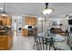 Open kitchen and dining area with seamless access to a warm and inviting living space at 11 Smoketree Ct, Durham, NC 27712