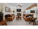 Cozy living room with a fireplace, comfortable seating, and elegant decor at 11 Smoketree Ct, Durham, NC 27712
