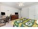 This is a large bedroom featuring natural light, neutral paint and a ceiling fan at 1101 Washhouse Ln, Wake Forest, NC 27587